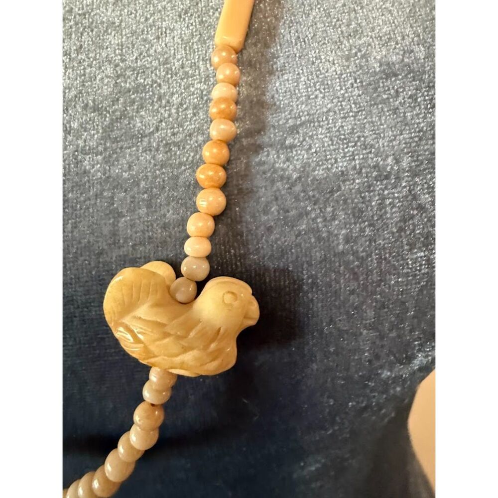 vintage necklace featuring  wooden carved animal-shaped pendants and beads - Picture 3 of 6